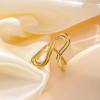 Anel Dourado Abstrato em Aço Inoxidável –  Joia Minimalista Banhada a Ouro 18K